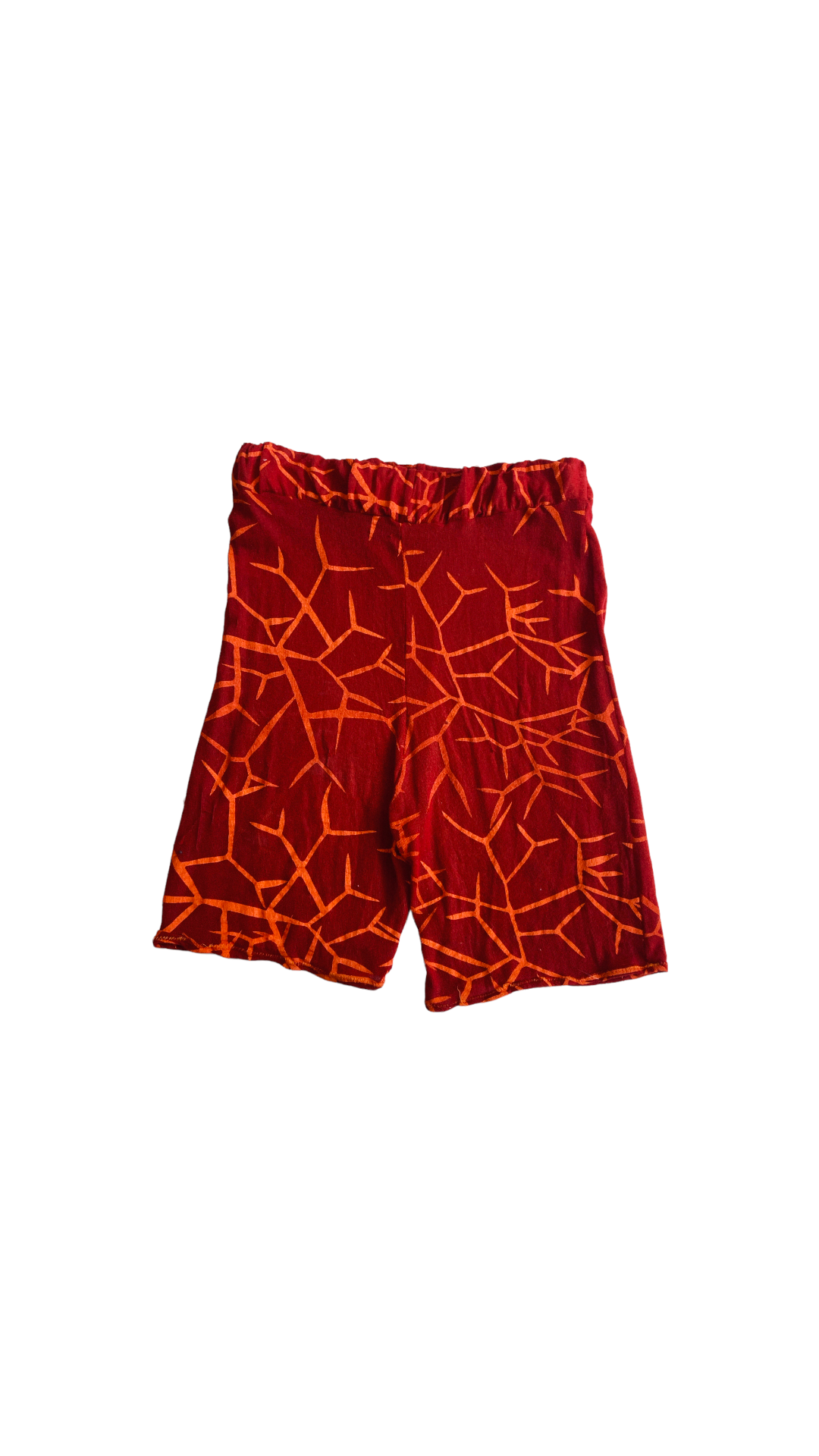 Product shot of the Mona Cordes long sleeve, red, printed, biker shorts. The print has bright orange abstract lines that resemble tree roots.