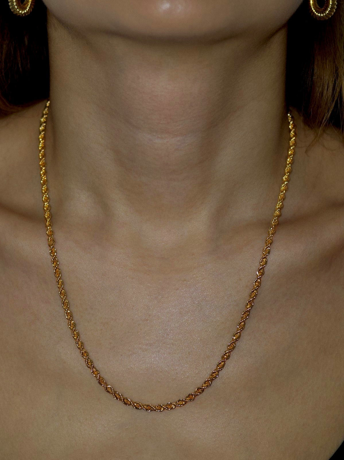 Model wearing 18k gold filled necklace